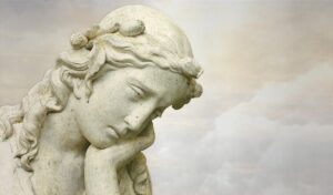 Mournful female stone statue